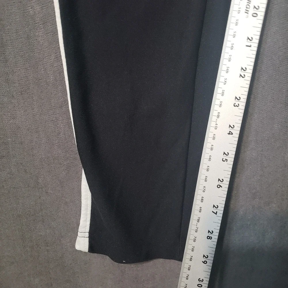 Under Armour Track Pants Mens Medium Black White Stripe Ankle Zip